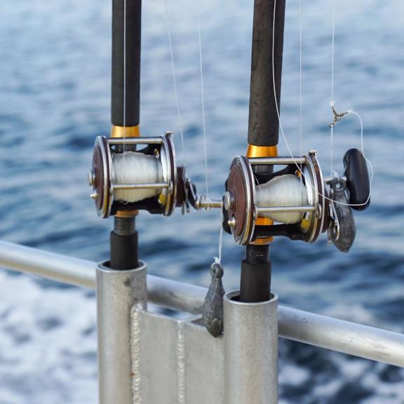 Fishing rods on a deep-sea charter in Orange Beach