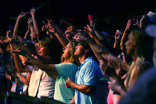 Concert goers enjoying music at The Wharf