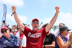 Person celebrating a win on Alabama's Beaches