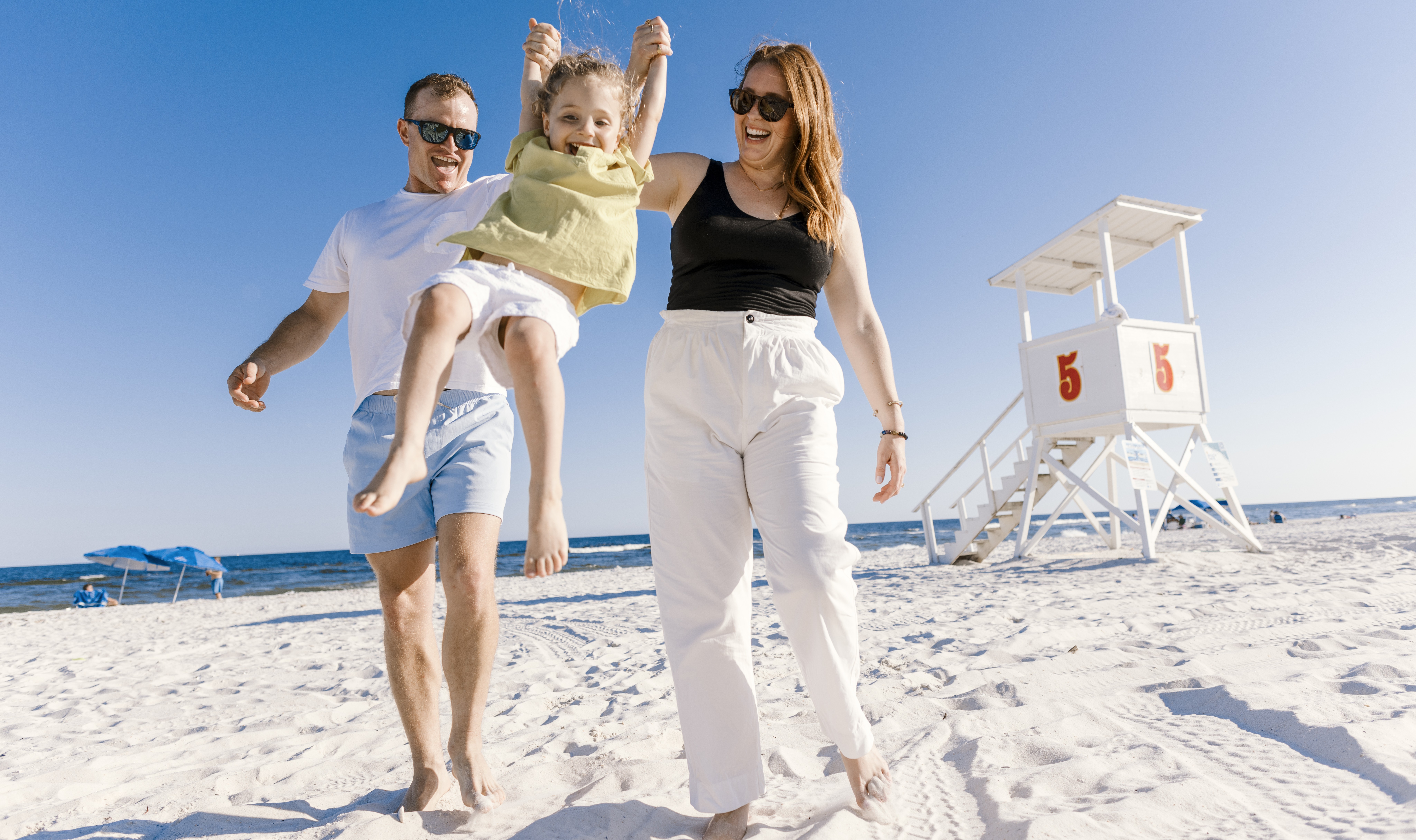 family enjoying their day on Alabama's Beaches.