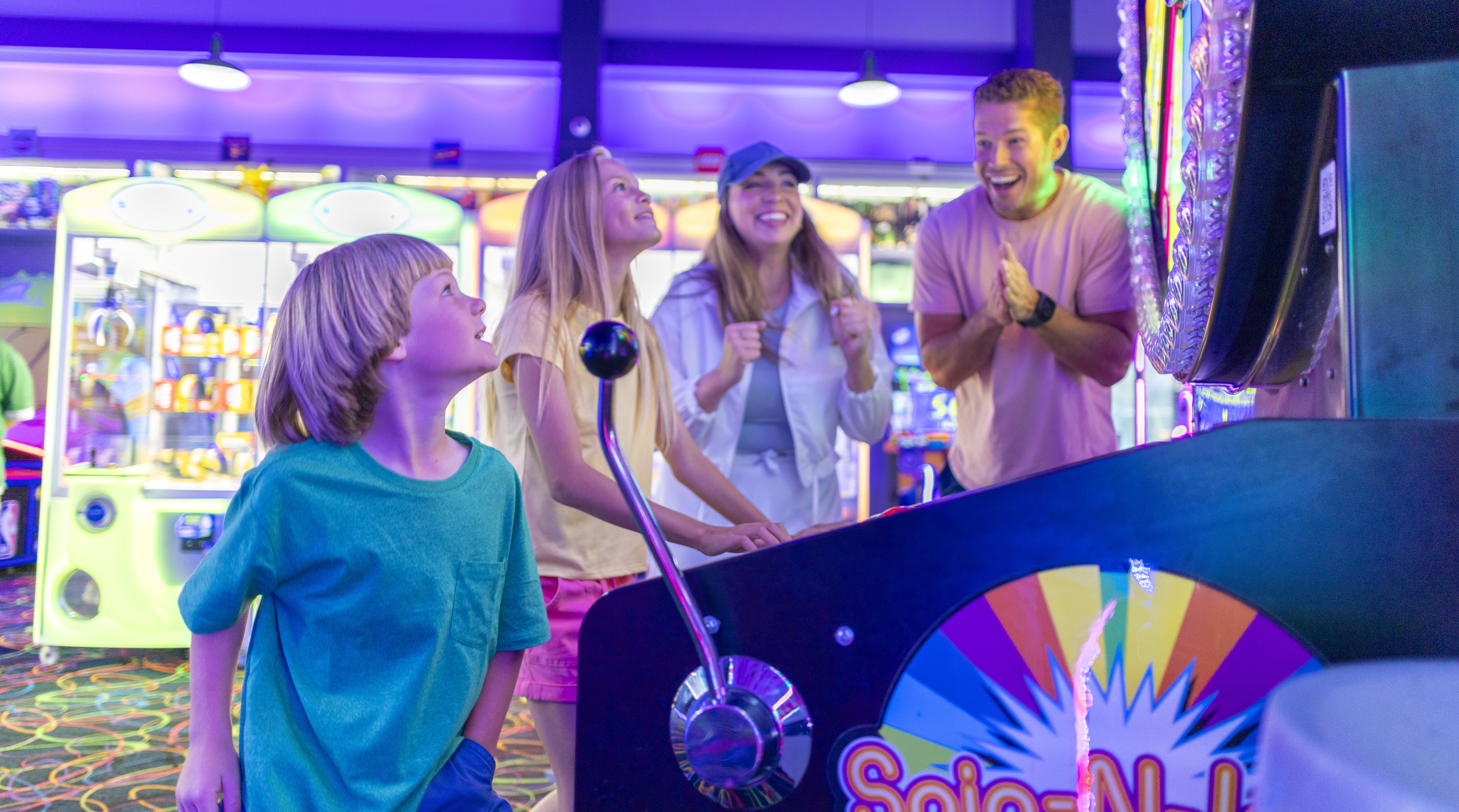 a family at an arcade