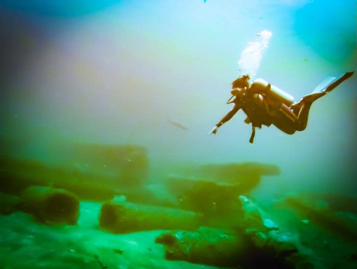 Woman scuba diving in Orange Beach, AL