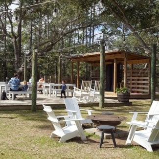 Scenic, outdoor dining at Woodside Restaurant in Gulf State Park