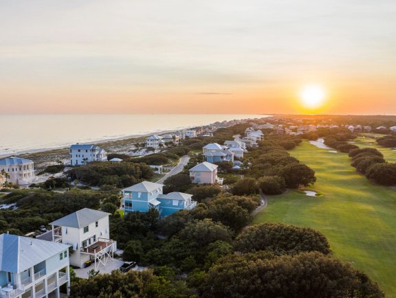 aerial view of Kiva Dunes Golf Resort in Fort Morgan during sunset