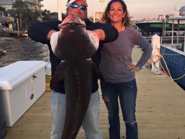 Couple holding Cobia Fish