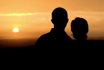 Couple at sunset Orange Beachk