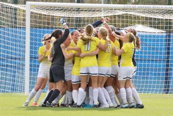 Girls Soccer Team celebrates in Gulf Shores