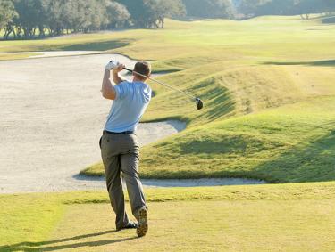 Golfer at Kiva Dunes Golf Course
