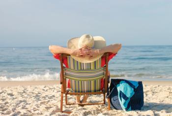 Woman relaxing on the beach in Alabama