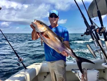 Guy on a deep sea fishing trip Gulf Shores, AL