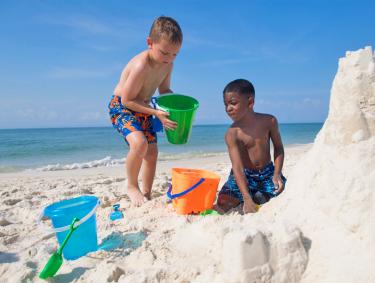 Boys playing on Alabama's Beaches