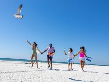 Family enjoying Gulf Shores public beach