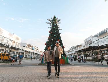 Father and son at The Wharf during Christmas