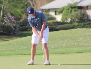 Player putting a golf ball at Craft Farms Golf Course