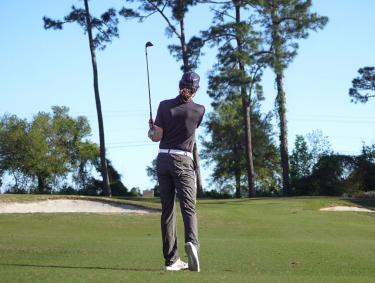 Golfer playing One Club Golf Courses in Gulf Shores