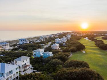 aerial view of Kiva Dunes Golf Resort in Fort Morgan during sunset
