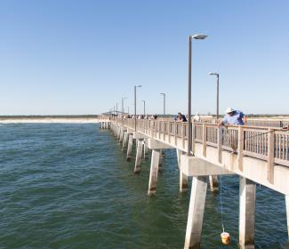 Men fishing from Gulf State Park Pier Fishing Gulf Shores AL