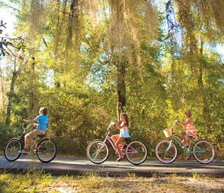 Kids biking on Hugh S. Branyon Backcountry Trail in Gulf Shores AL