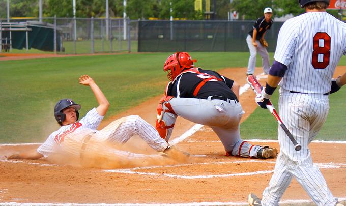 Baseball Player Slides into Home plate