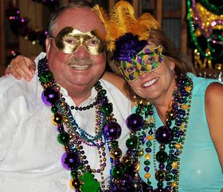 Couple at LuLu's Mardi Gras Ball in Gulf Shores