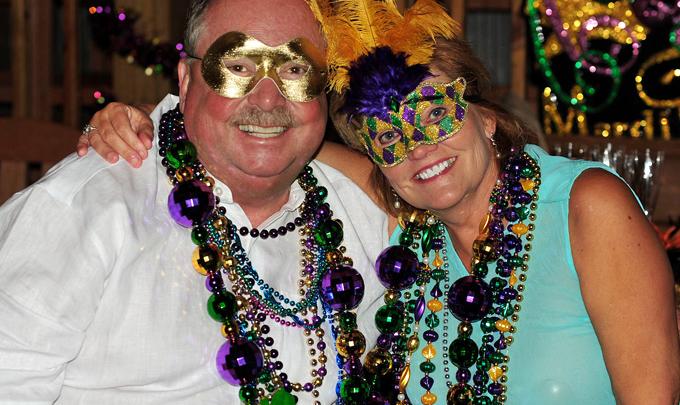 Couple at LuLu's Mardi Gras Ball in Gulf Shores