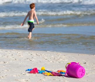 Boy and Sand Toys on Alabama's Beaches