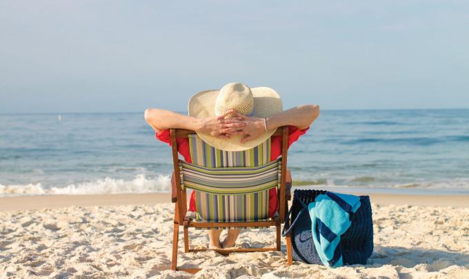 Woman relaxing on the beach in Alabama