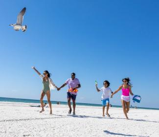 Family enjoying Gulf Shores public beach