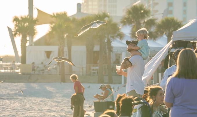 People enjoying Shrimp Fest in Gulf Shores, best beach festival