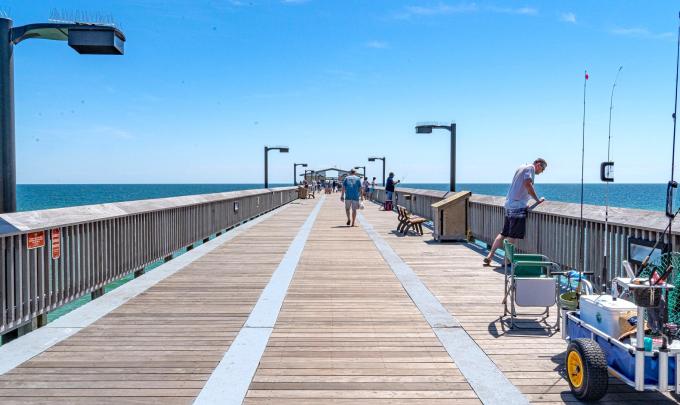 People fishing on the Gulf State Park Pier