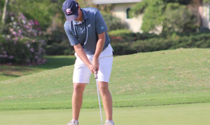 Player putting a golf ball at Craft Farms Golf Course