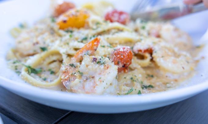 Plate of shrimp pasta at Zeke's Restaurant in Orange Beach