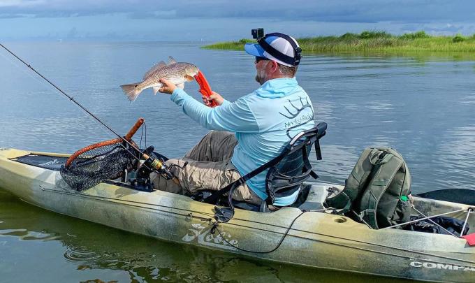 Angler kayak fishing in the back bays of Gulf Shores