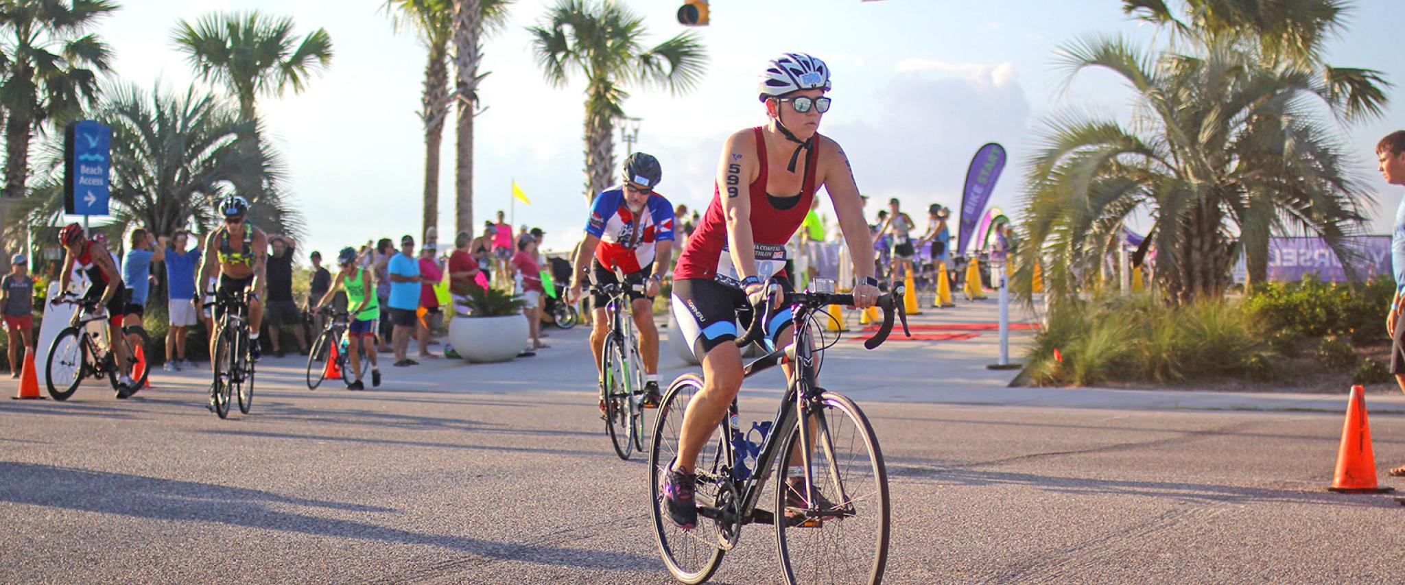 Bike riders compete in Alabama Coastal Triathlon in Gulf Shores AL