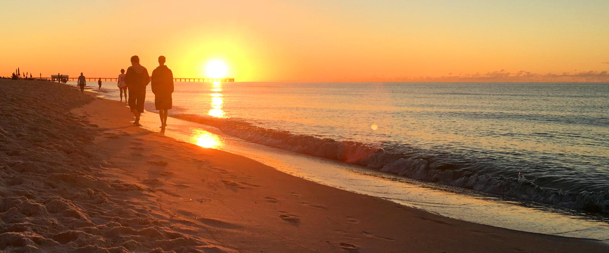 Snowbirds walking on Alabama's Beaches