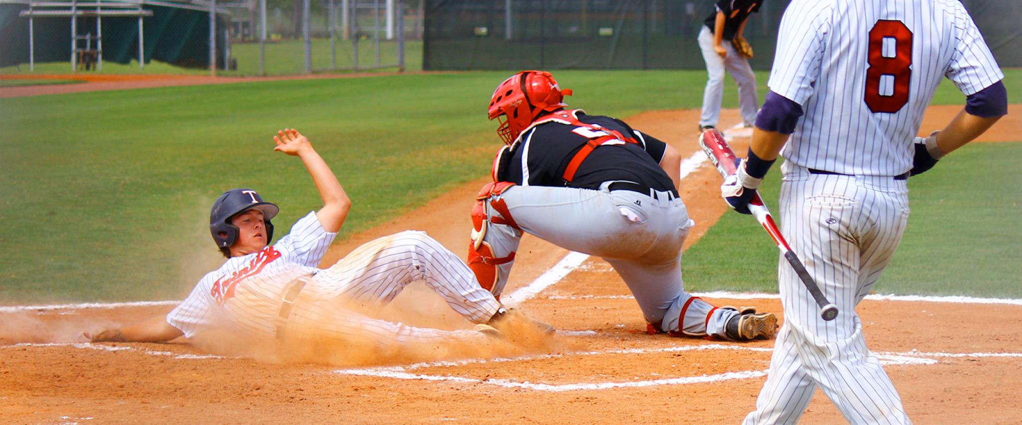 Baseball Player Slides into Home plate