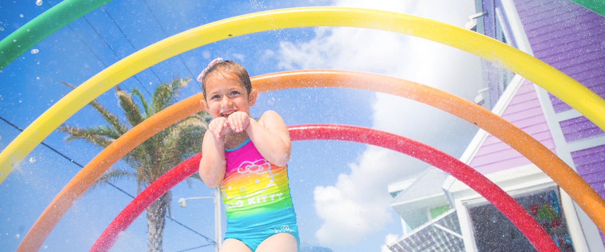 Girl plays at splash pad in Gulf Shores