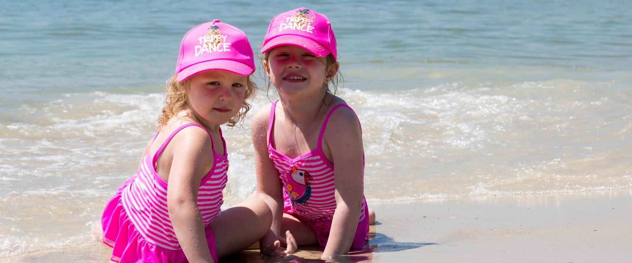 sisters on the beach in Gulf Shores AL