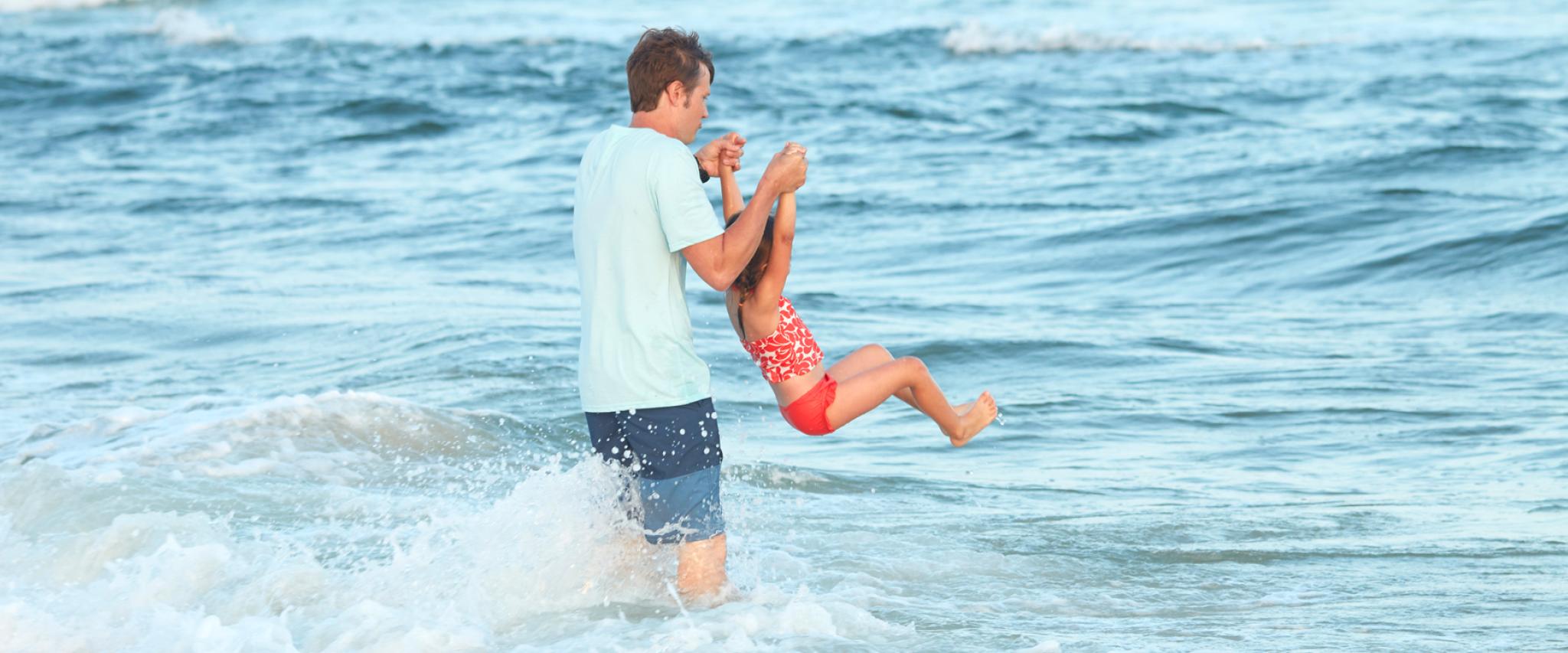 Dad and daughter on Alabama's Beaches