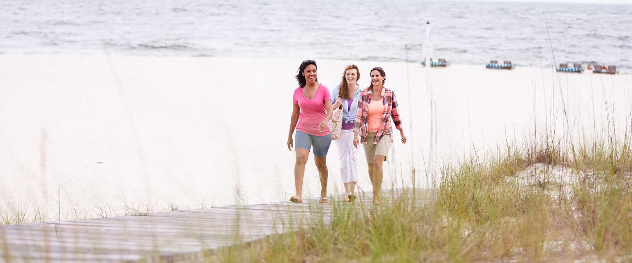 Girlfriends walking on Alabama's Beaches