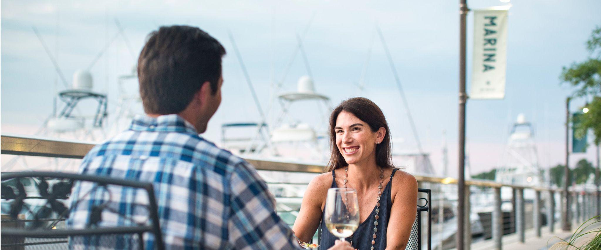 Couple dining at The Wharf in Orange Beach