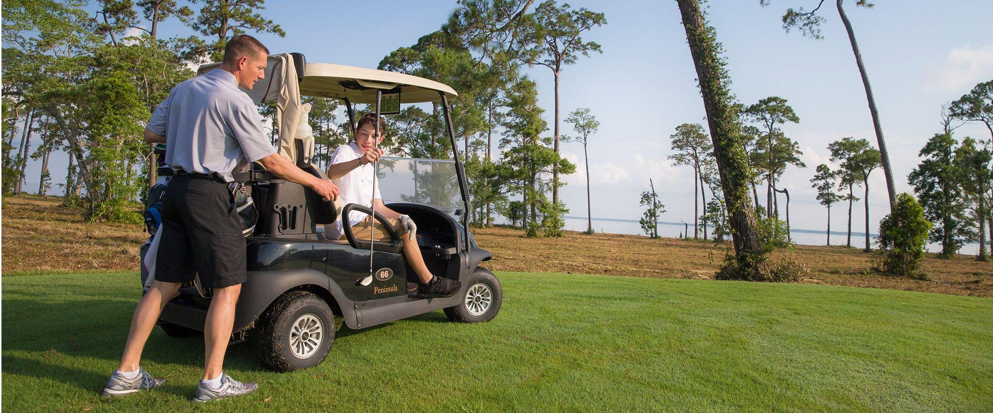 Father and son golfing in Gulf Shores, AL