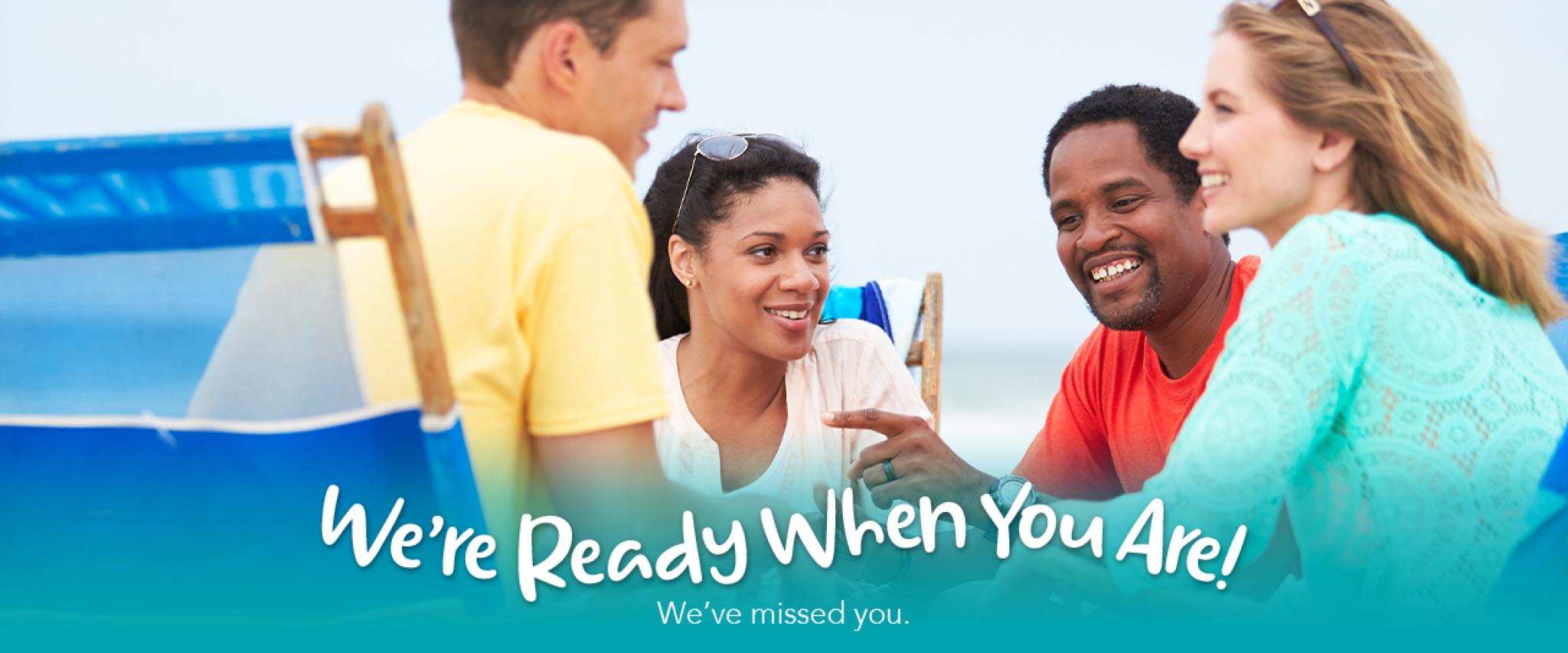 two couples in beach chairs in orange beach al
