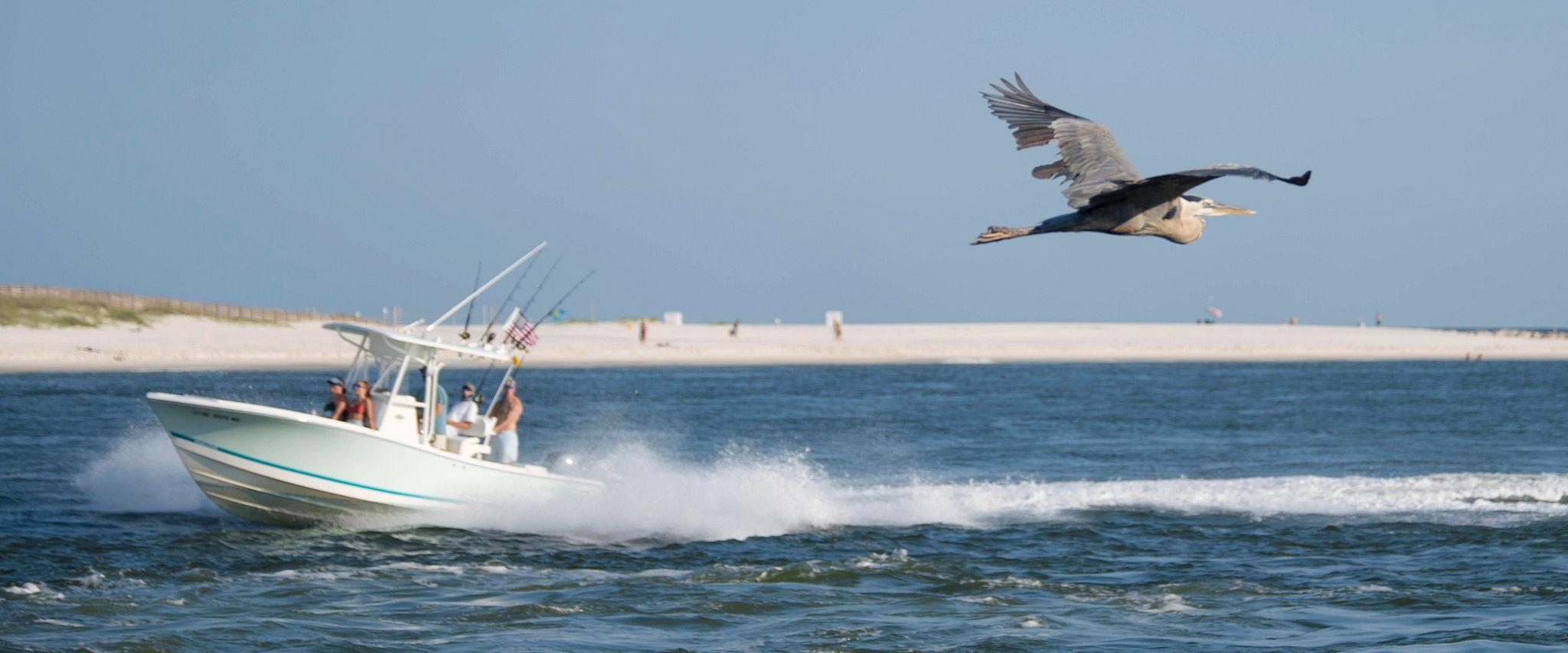 Boats going into the pass in Orange Beach, AL