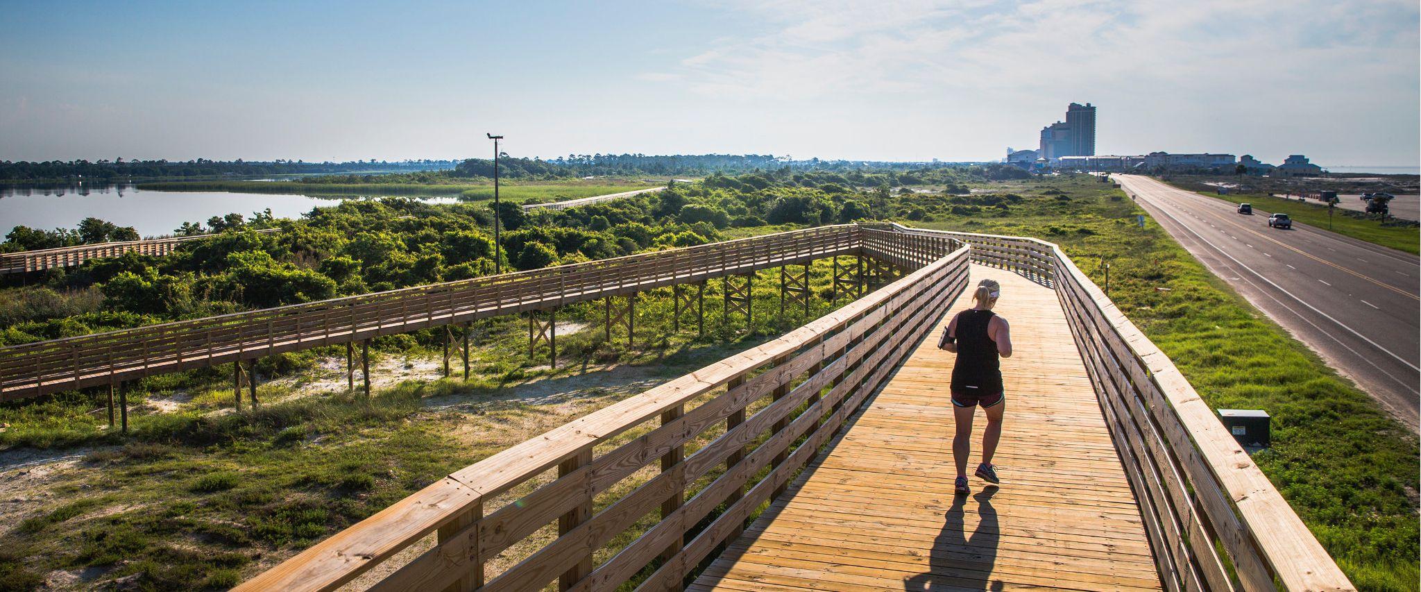 Woman running at Gulf State Park