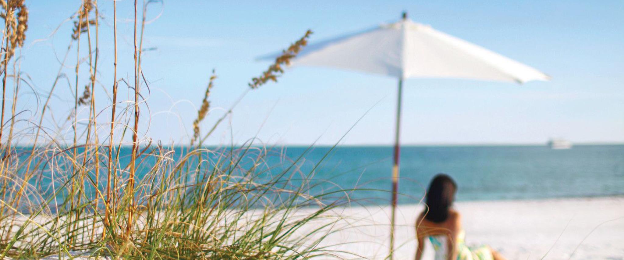 lady in beach chair gulf shores