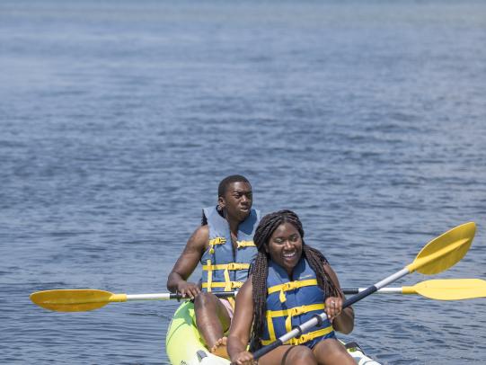 Couple kayaking in Orange Beach, AL