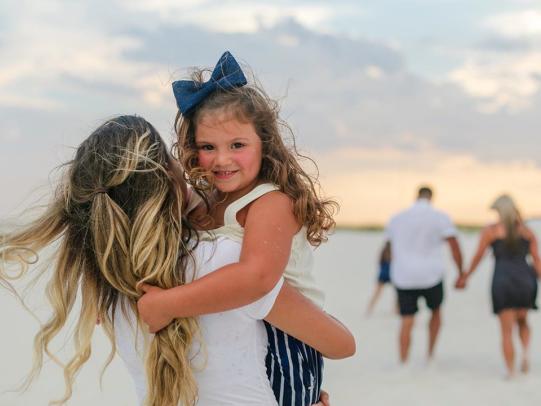 Family portrait on the beach in Gulf Shores, AL