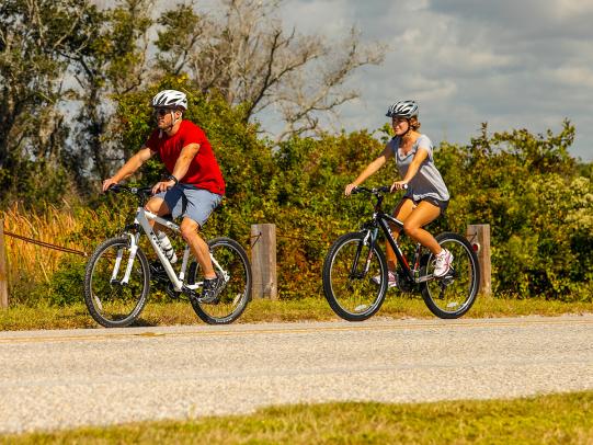 riding bikes along the beach in Gulf Shores AL