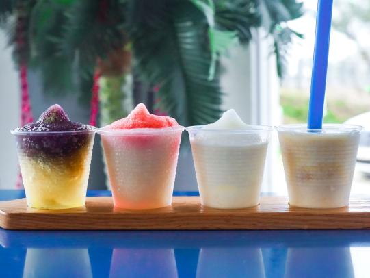 colorful daiquiri flight at High Tide Daiquiris & Mimosas in Gulf Shores